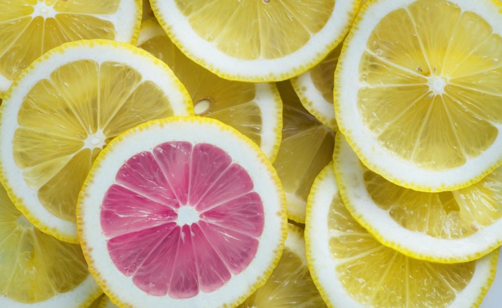 Do it differently to the crowd. Image shows slices of lemon, with one being pink not yellow.
