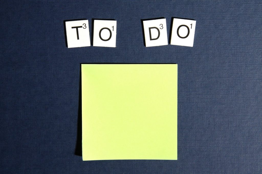 Create a content marketing strategy for your small business. Image shows a yellow post it note and the words To Do
