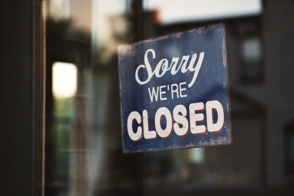 A shop sign saying "sorry we're closed". Time to stop selling