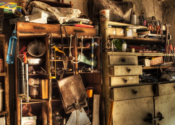Image shows a dusty collection of ephemera, typical of many garages or understairs cupboards. Make sure you collect your stories and use your stories