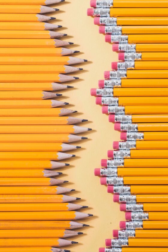 Image shows a zigzag pattern of yellow pencils